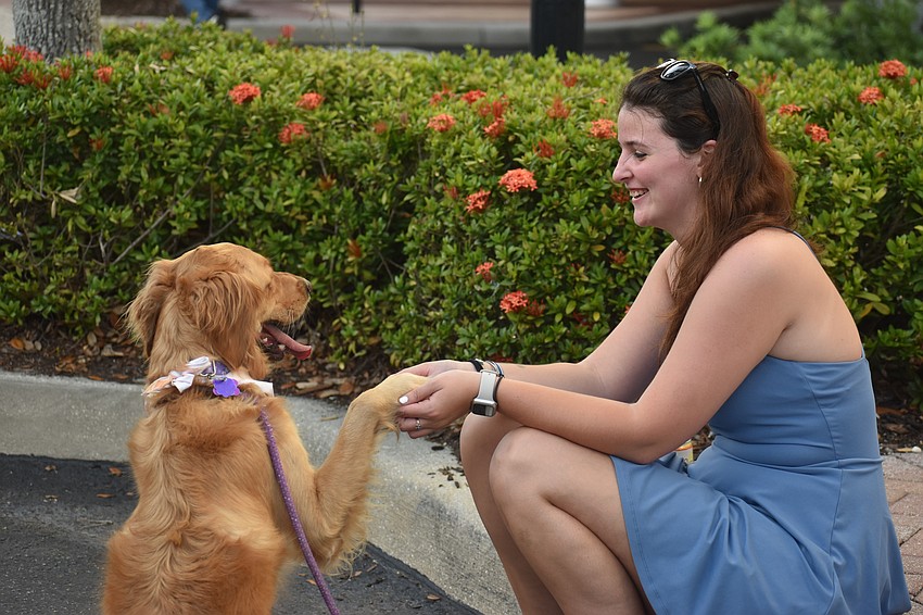 Bradenton's Jordan Smith, who came to Woofstock after seeing it on Facebook, says her Golden retriever Nala is always loving and happy.