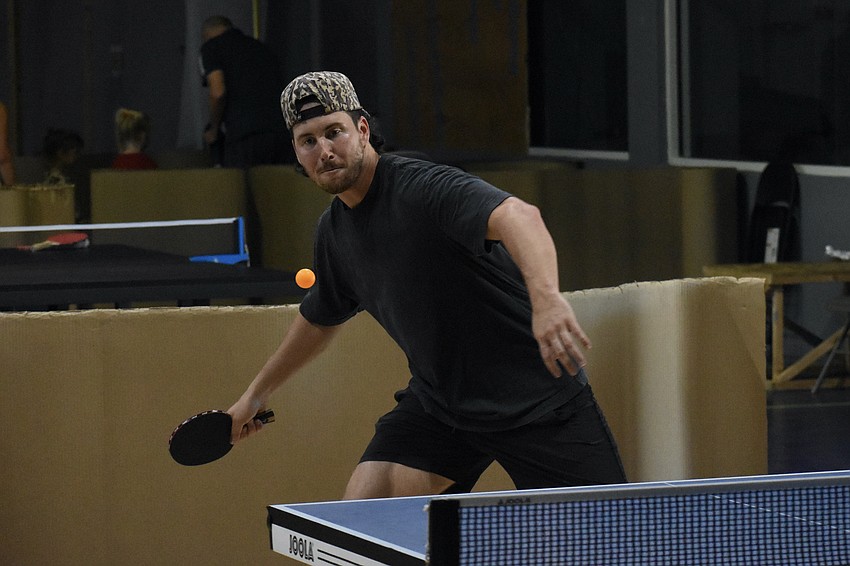 Major League Baseball player Jack Snyder of the Tampa Bay Rays plays table tennis.