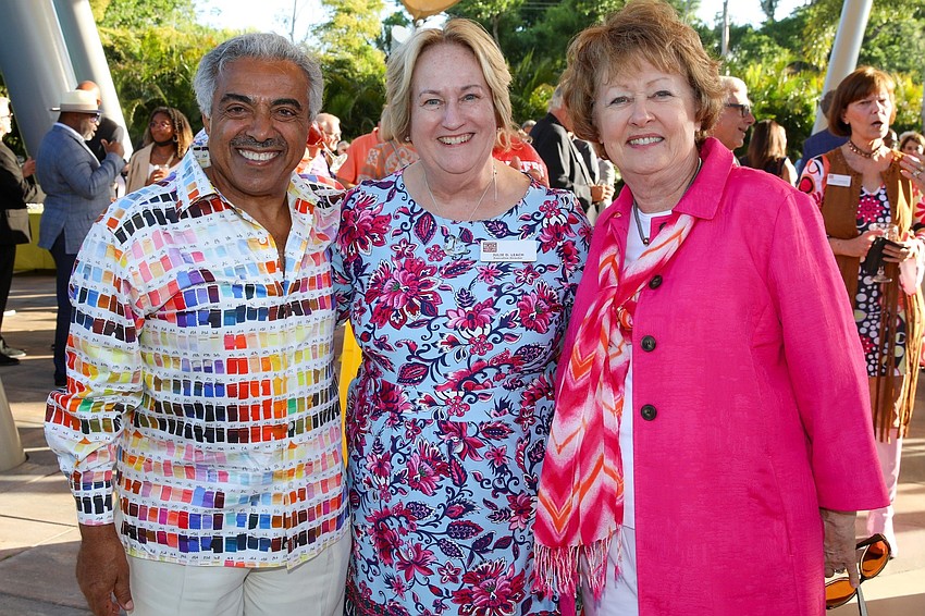 The most talked about shirt at the fête was Ali Bahaj's Pantone design. He is photographed with WBTT Executive Director Julie Leach and his wife, Gloria.