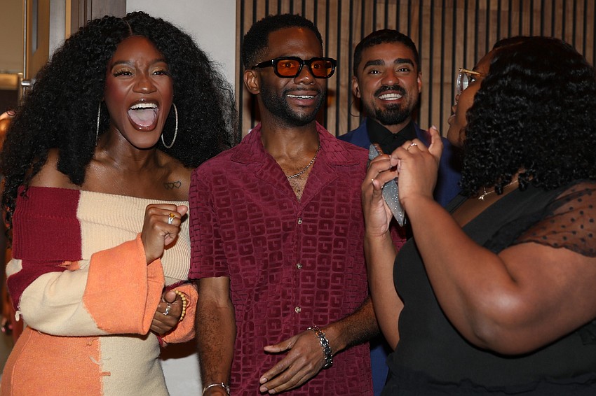 Performers watch the students put on their show.