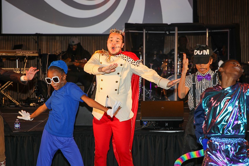 Student performers take the stage.