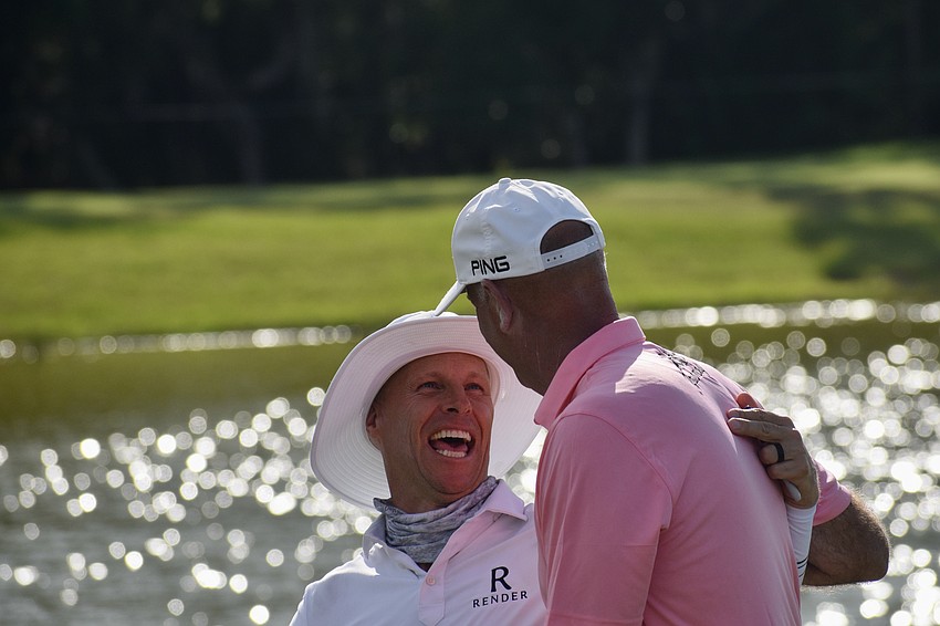 Ben Crane (left) shares a laugh with Stewart Cink (right) following Cink's victory. He shot 4-under par April 19, but still finished six strokes behind Cink.