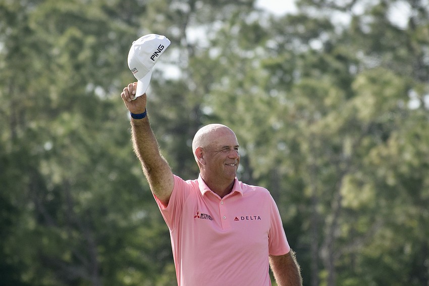 Stewart Cink salutes the crowd surrounding the 18th hole at The Concession. The Senior PGA Championship is scheduled to return for 2027 and 2028 as part of a three-year contract between the club and the PGA of America.