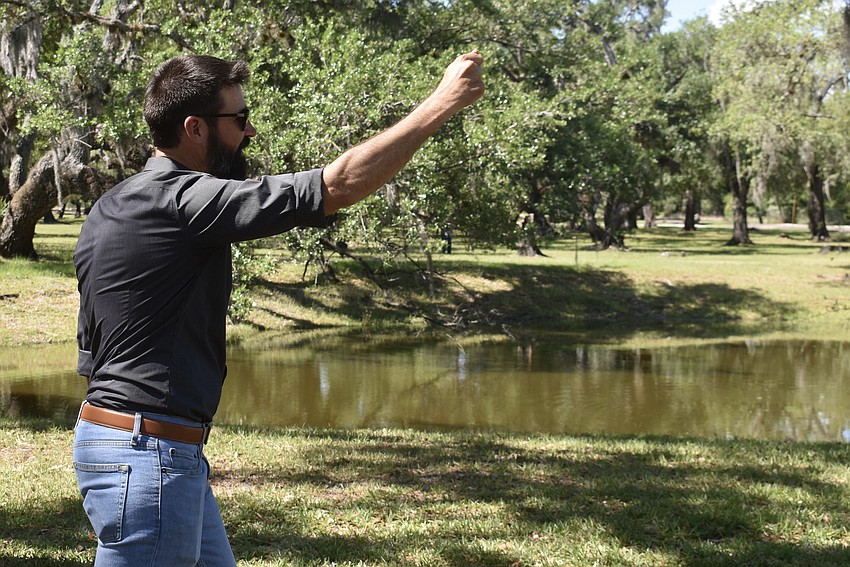 Like mother, like son — Nicholas Felts teaches guests how to crack a whip following the ceremony.