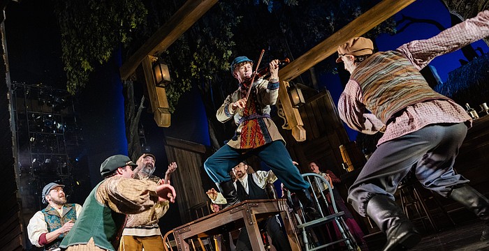Maxim Chlumecky is at the center of the action in this scene from Asolo Rep's "Fiddler on the Roof," which runs through May 24 at FSU Center for the Performing Arts.