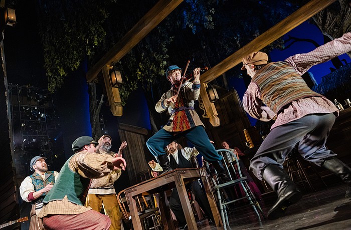 Maxim Chlumecky is at the center of the action in this scene from Asolo Rep's "Fiddler on the Roof," which runs through May 24 at FSU Center for the Performing Arts.