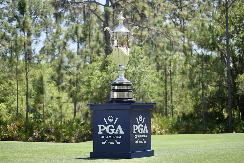 The Alfred S. Bourne Trophy sits by the first-hole tee. At 36 pounds, it ranks among the heaviest awarded in professional golf.