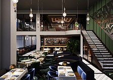 1000 North will feature a floating staircase connecting the downsairs dining room with the walnut-lined second-floor lounges.