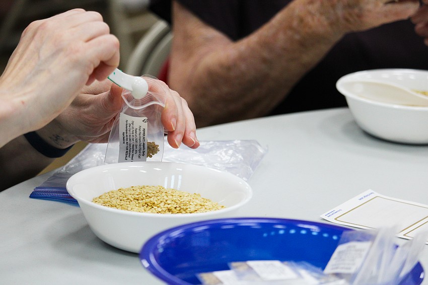 Volunteers joined in the final Hope Seeds packing day of the season on April 13 at Christ Church of Longboat Key.