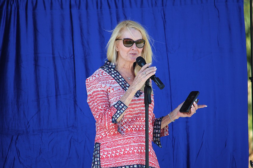 Longboat Key Foundation board chair Susan Phillips introduces the evening's lineup of stand-up comedians on April 16 at the Town Center Green. The second-annual Comedy Night was part of this year's Arts in April celebration.