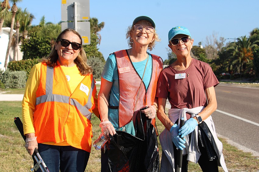 Kelli Veit, Christ Church of Longboat Key's Rev. Julia Piermont and Cindy Ritchell team up at the Faith 250 cleanup.