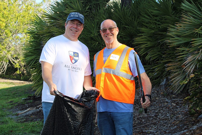 All Angels by the Sea Episcopal Church's Rev. David Marshall and St. Armands Key Lutheran Church's Rev. Kenneth Blyth work together at the Faith 250 clean-up.