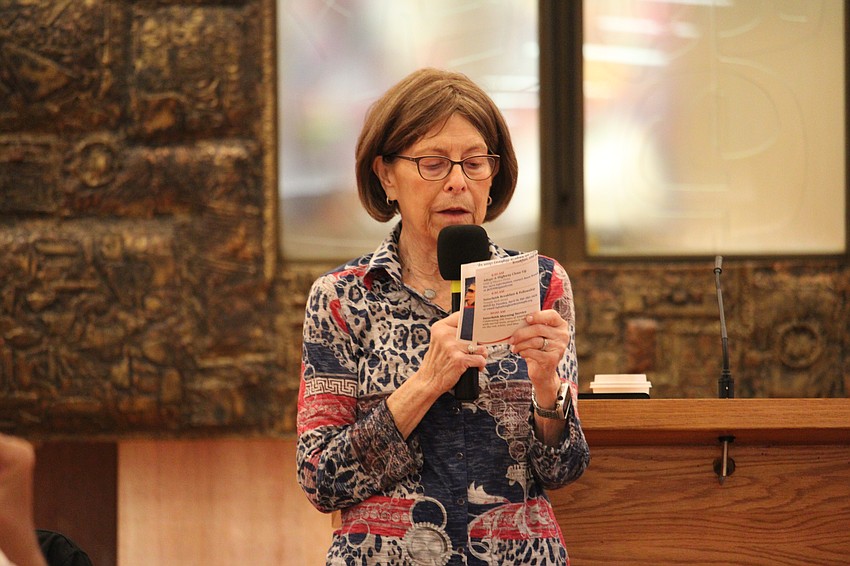 Anne Lieberman read aloud a poem based on Henry Wadsworth Longfellow's work entitled 