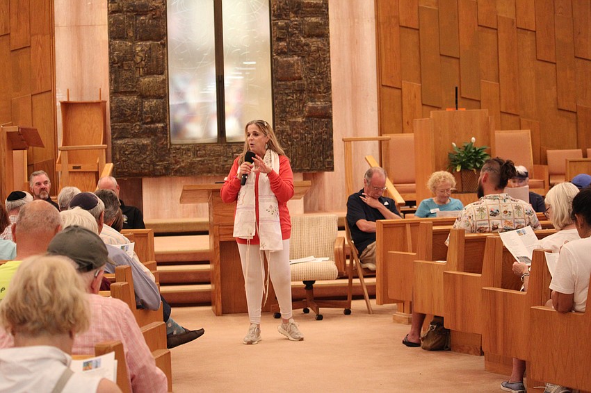 Temple Beth Israel's Rabbi Jessica Spitalnic Mates welcomes one and all to the morning service.