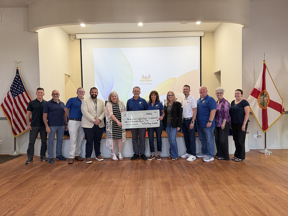 Representatives from Windermere Town Council, the Windermere Legacy Fund and the West Orange Foundation celebrated the success of this year’s Windermere Wine & Dine.