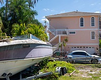 The house at 501 General Harris Street has received attention from neighbors, city code enforcement, banks and courts as foreclosure of the property inches along while maintenance is lacking.