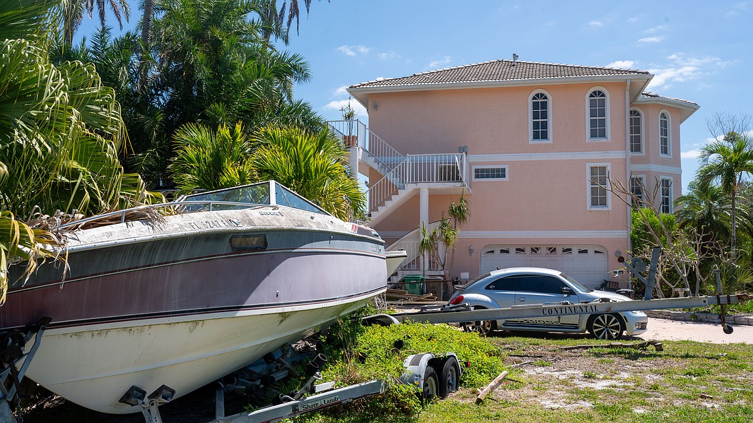 The house at 501 General Harris Street has received attention from neighbors, city code enforcement, banks and courts as foreclosure of the property inches along while maintenance is lacking.