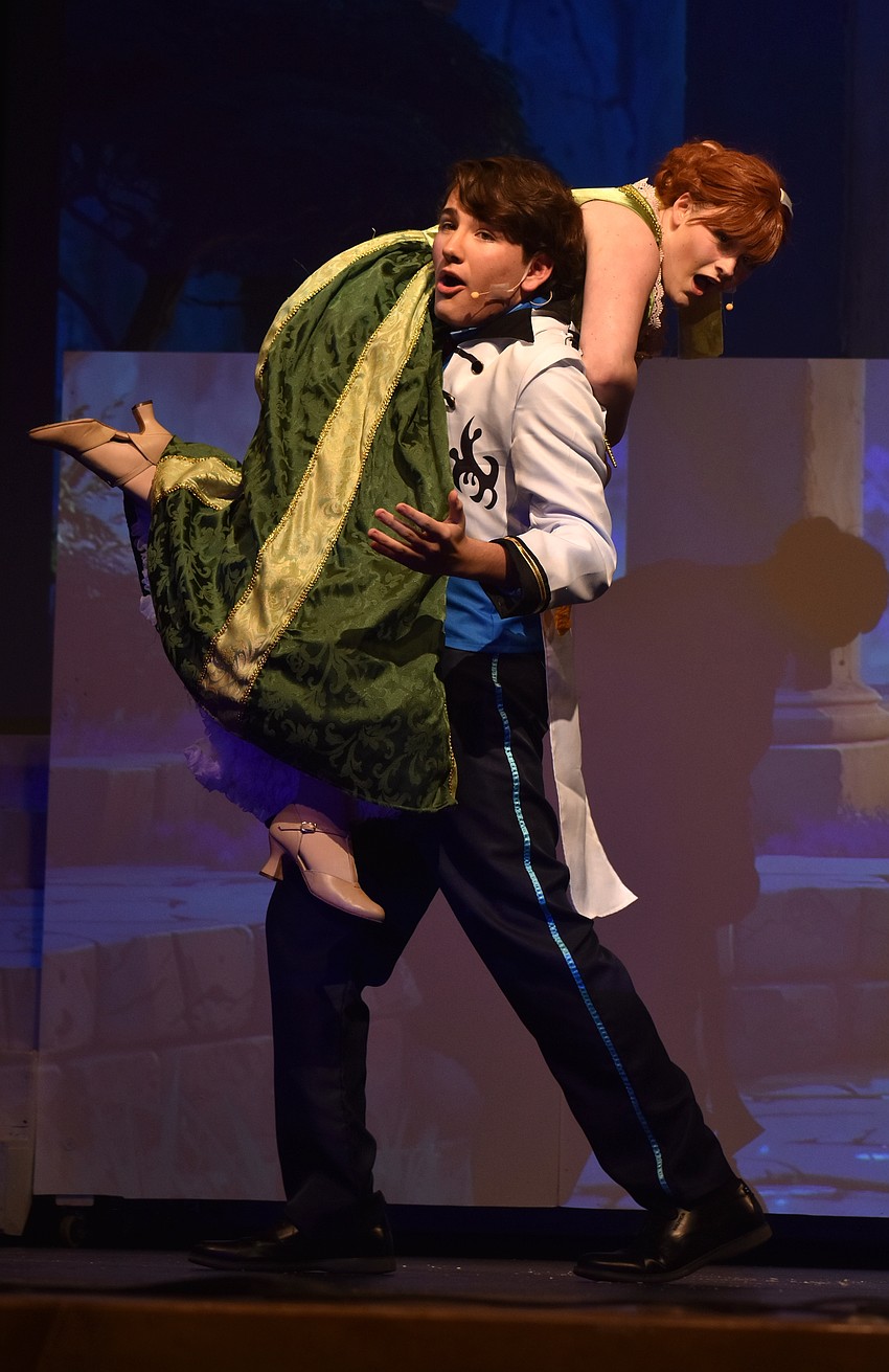 Sophomore Chase Christie and senior Skylah Siegel  sing 