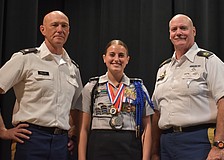 Elisa Massaro, a senior and battalion commander of the Lakewood Ranch High School Junior Reserve Officers' Training Corps, is glad to have had the support of her teachers Richard Roller and William Cassidy.