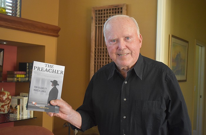 Tom Bleakley's "The Preacher" follows a young Detroit lawyer who takes on the defense of a woman charged with the killing of her husband. It is co-authored by Marcia Krajewski, another Lakewood Ranch resident.