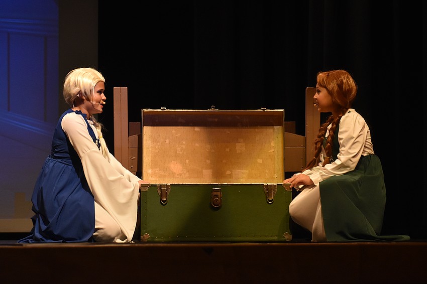 Real life sisters Amelia and Alice Shamierva play the young versions of Elsa and Anna in the Lakewood Ranch High School production of 