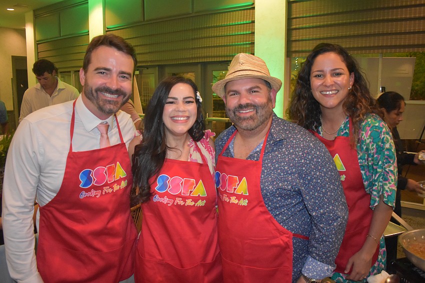 Shane Lamay, Lissette Callejas, Oscar Callejas and Amanda Reyes-Martin get in uniform.
