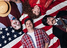 In The Sarasota Players' production of "Assassins," Brian Finnerty (upper left) plays The Proprietor, Caitlin Ellis is Squeaky Fromme, Craig Weiskerger is John Wilkes Booth and Jason Ellis is the Balladeer.