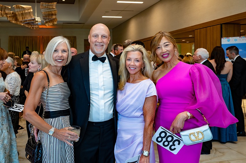 Melissa and Scott Stevens, Crystal Lahners and Ping Faulhaber