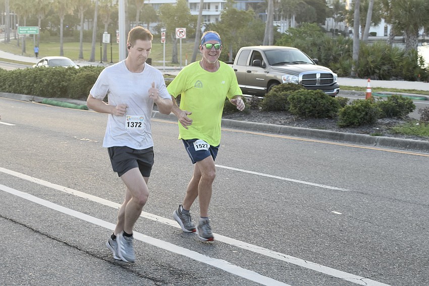 Logan Smith and Rob Loeffler make their way along the course.