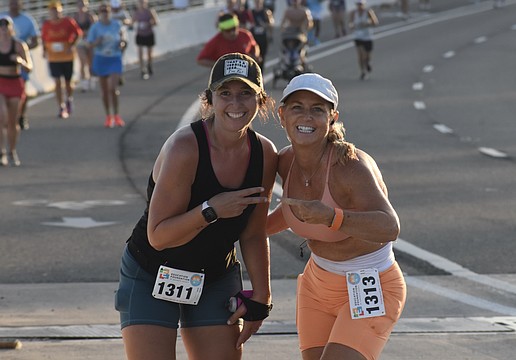 Rebecca Resinski and Amy Stevens show their support.