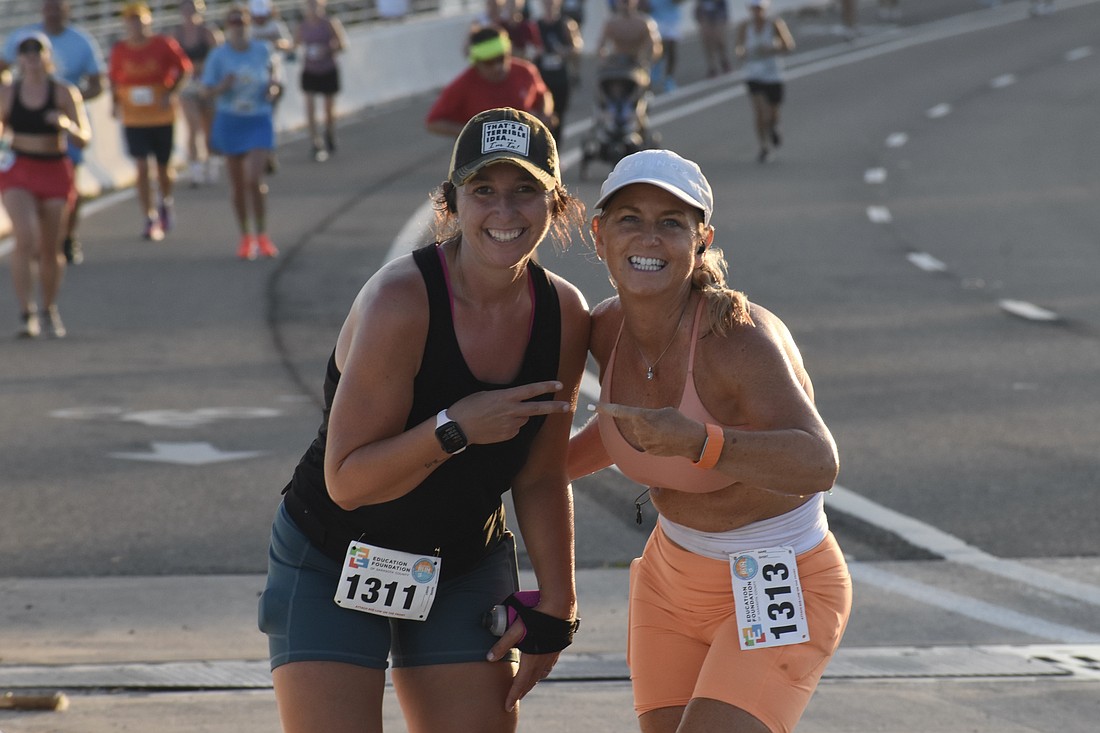 Rebecca Resinski and Amy Stevens show their support.
