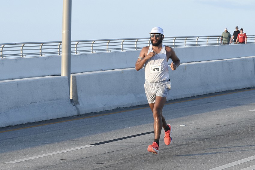 First place overall winner Julian Gomez heads across the Ringling Bridge.