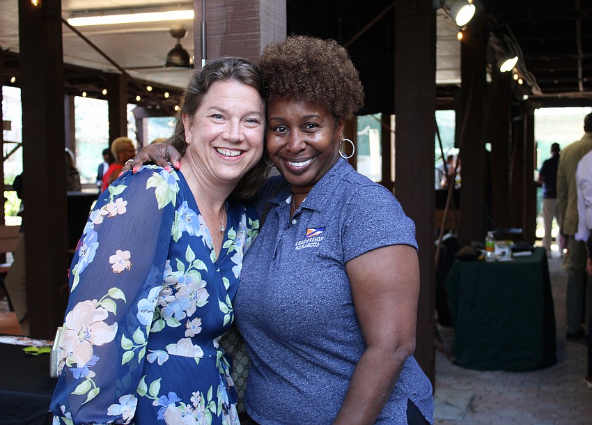 Leadership Sarasota classmates Jamie Smith, associate vice president of communications and government relations at State College of Florida, Manatee-Sarasota, and Jeanine Johnson, owner of SailorGirl Companies, celebrate the Save Our Seabirds renovation.
