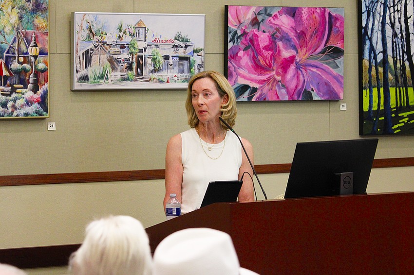 Town of Longboat Key Mayor Debra Williams thanks everyone, especially the local artists, who helped make the 10th annual Town Hall artists' reception and exhibition a success on April 23. The gallery will be on display through the beginning of July.