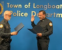 Albert Miano Jr. is sworn in as the newest officer of the Longboat Key Police Department Wednesday, April 15.