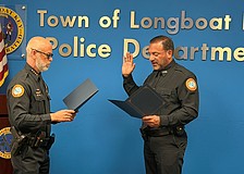 Albert Miano Jr. is sworn in as the newest officer of the Longboat Key Police Department Wednesday, April 15.