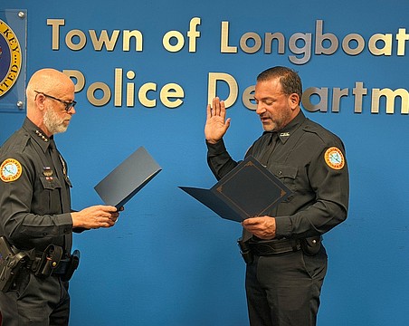 Albert Miano Jr. is sworn in as the newest officer of the Longboat Key Police Department Wednesday, April 15.