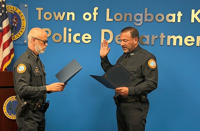 Albert Miano Jr. is sworn in as the newest officer of the Longboat Key Police Department Wednesday, April 15.