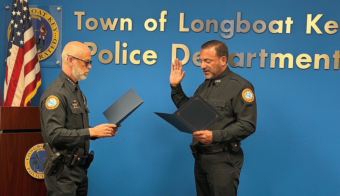 Albert Miano Jr. is sworn in as the newest officer of the Longboat Key Police Department Wednesday, April 15.