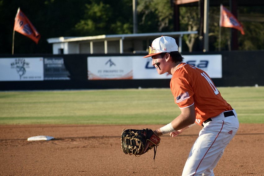 Kole Ayrault prepares to field a grounder at first base. He was Sarasota's top hitter this season, but facing Plant City, went 0-for-3 at the plate.
