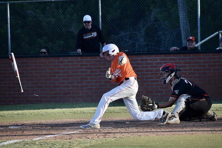 Mark Metcalf breaks his bat on a swing. He accounted for the Sailors' only run in the regional quarterfinal, scoring in the bottom of the first inning.