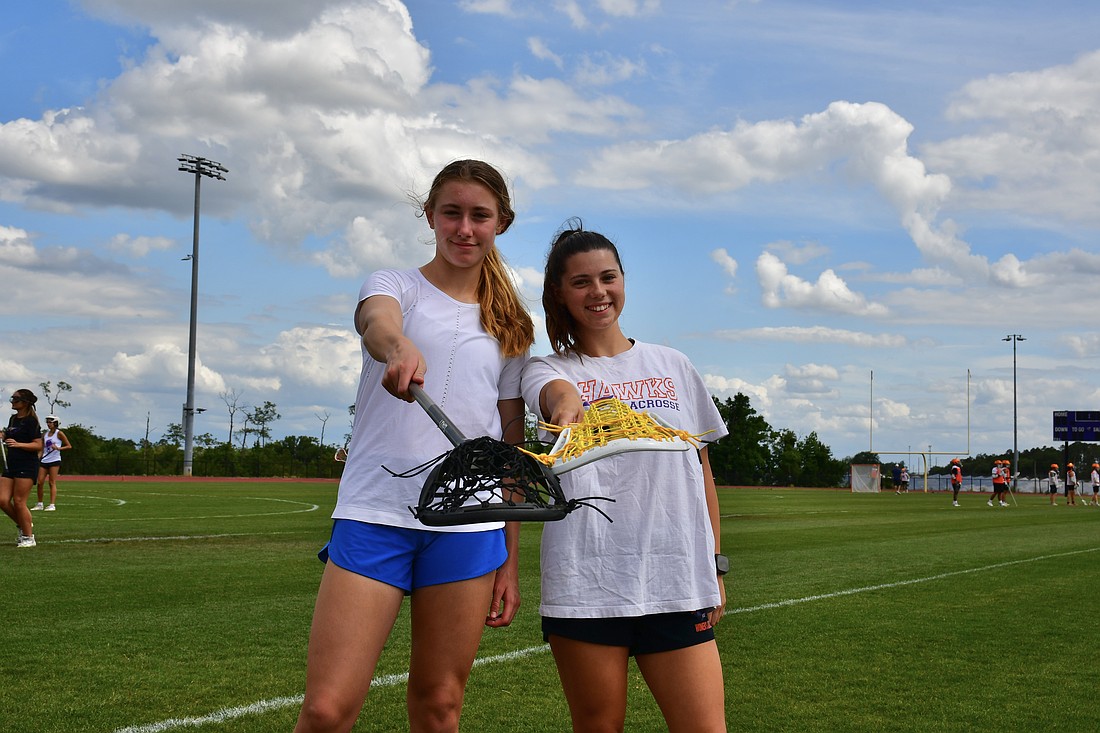 Horizon High girls lacrosse team’s leading scorers Sarah Walsh and Izzy Scarpulla helped the team win two consecutive district championships.