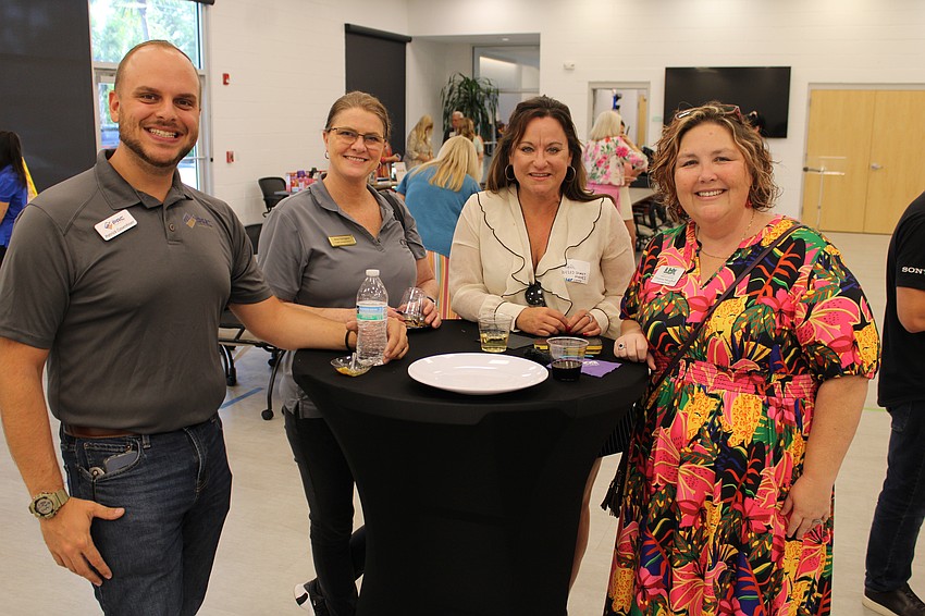 Patrick Casenhiser, Amy Torrington, Beth Robertson and Deanna Mesghali attend the April 29 Off the Clock meetup at the Humane Society of Sarasota County headquarters.