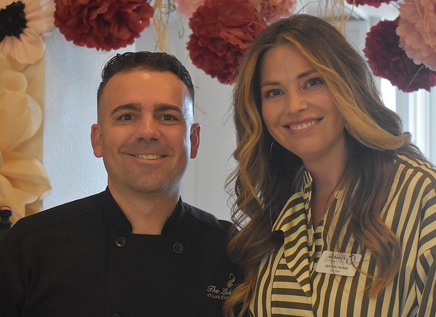 Lake Club chef Wesley Kirby, who cooked all of the appetizers, is glad to see people like Jennifer Alokeh, vice chair of The Lake Club Women’s Giving Circle, at events.