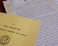 The original 1957 Longboat Key Town Charter is printed on rice paper and stored at Town Hall, along with copies of the original document printed in 1959.