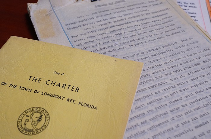 The original 1957 Longboat Key Town Charter is printed on rice paper and stored at Town Hall, along with copies of the original document printed in 1959.
