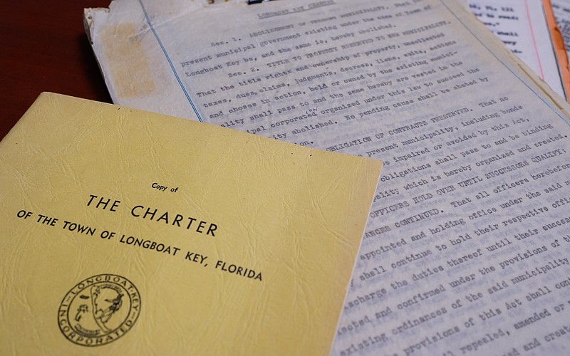 The original 1957 Longboat Key Town Charter is printed on rice paper and stored at Town Hall, along with copies of the original document printed in 1959.