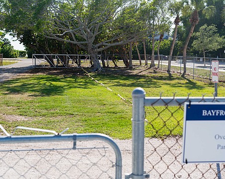 An overflow parking lot with 10 spots is open during the day at Bayfront Park accessible via Gulf of Mexico Drive.