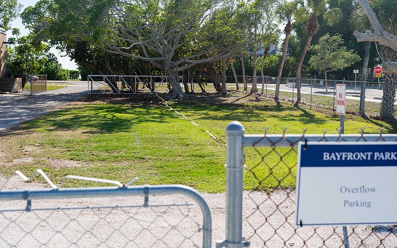 An overflow parking lot with 10 spots is open during the day at Bayfront Park accessible via Gulf of Mexico Drive.