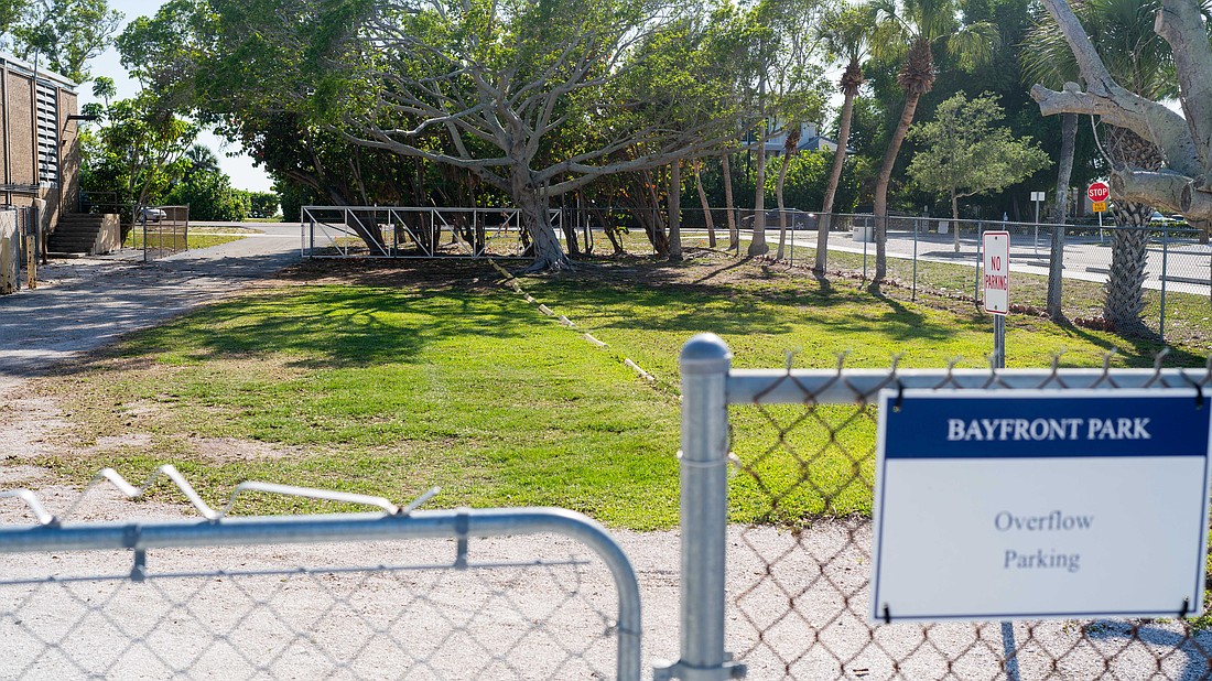 An overflow parking lot with 10 spots is open during the day at Bayfront Park accessible via Gulf of Mexico Drive.